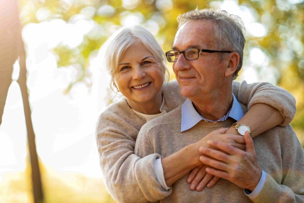 Healthy couple outsite thinking of reading an audiogram