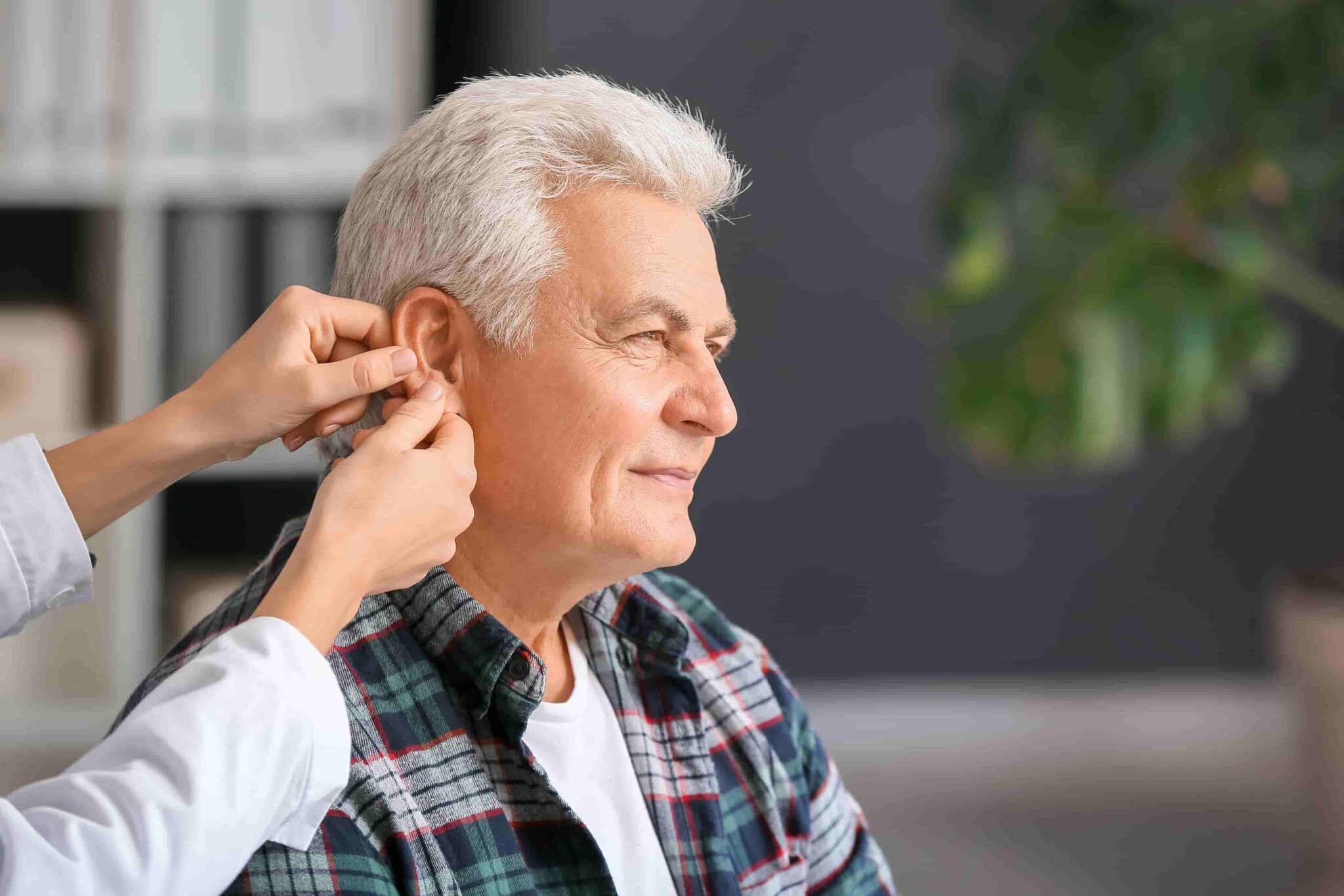 How to prevent your hearing aids from falling off your ears